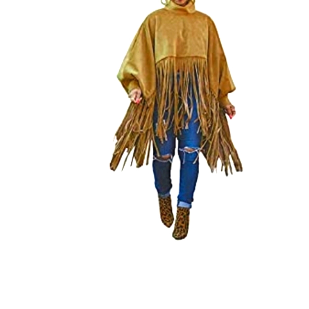 Poncho with oversized tassels